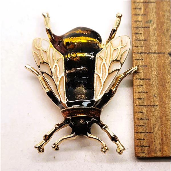 10) GOLD TONE WITH SHADES OF BROWN, YELLOW,