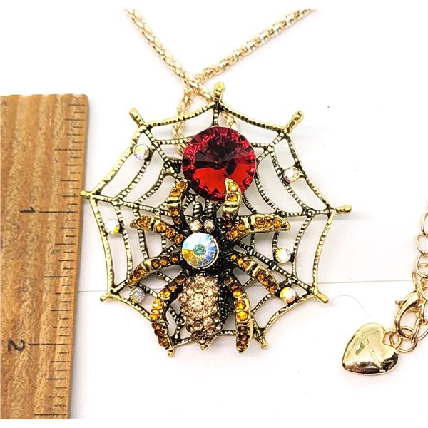 7)  GOLD TONE WITH YELLOW, RED AND  RAINBOW