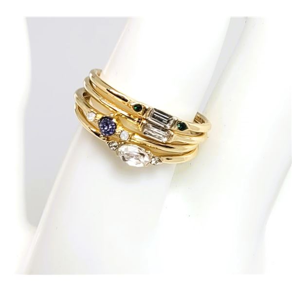 19)  SET OF 4 PCE GOLD TONE STACKING CZ RINGS,