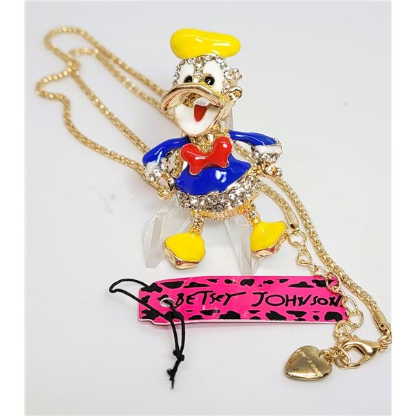 11)  GOLD TONE WITH CLEAR CRYSTALS AND WHITE,