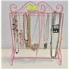 Image 1 : PINK JEWELRY STAND FULL OF COSTUME NECKLACES