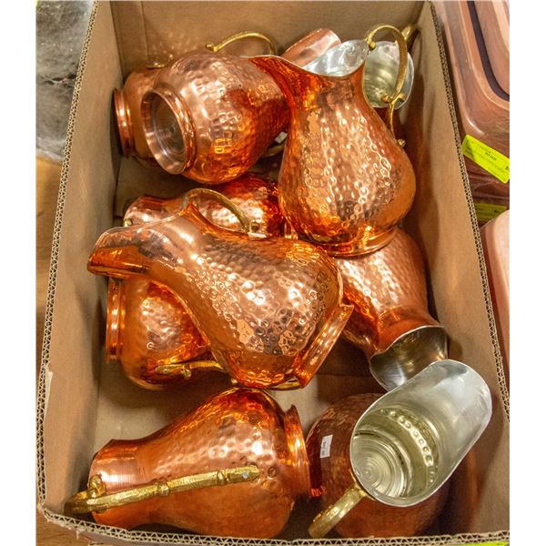 CASE OF COPPER PLATED PITCHERS