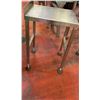 Image 1 : Stainless steel table. Approximately 1 1/2ft. Wide (Restaurant Grade)