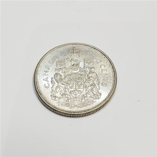 Silver Canadian 50 Cents Coin (~Size 0) (~length 0 inches) (~weight 11.5g), Suggested Retail Value $