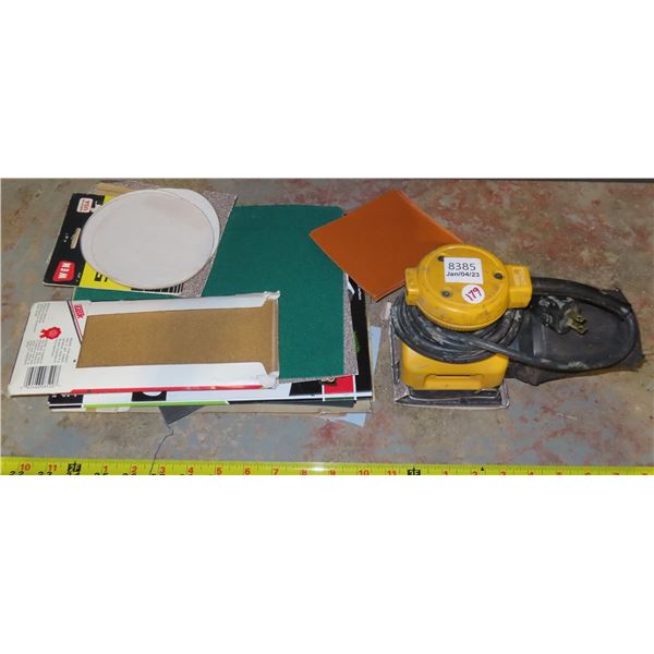 Sander with assorted sand papers