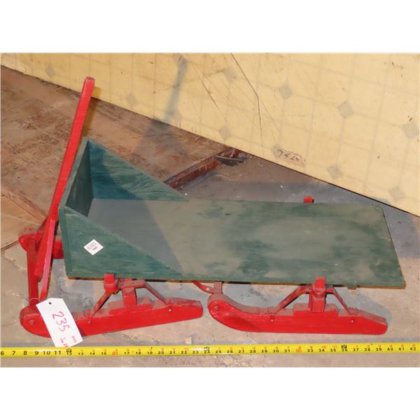 Wooden slay (Green top not attached to red base)