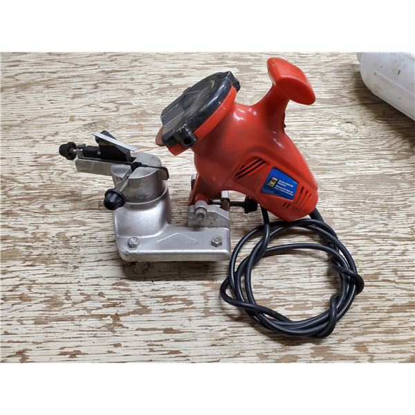 Powerfist chainsaw sharpener (powers on)