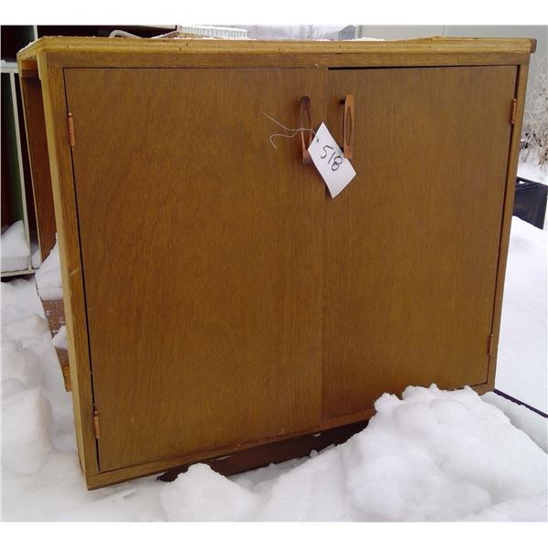 Double sided storage cupboard