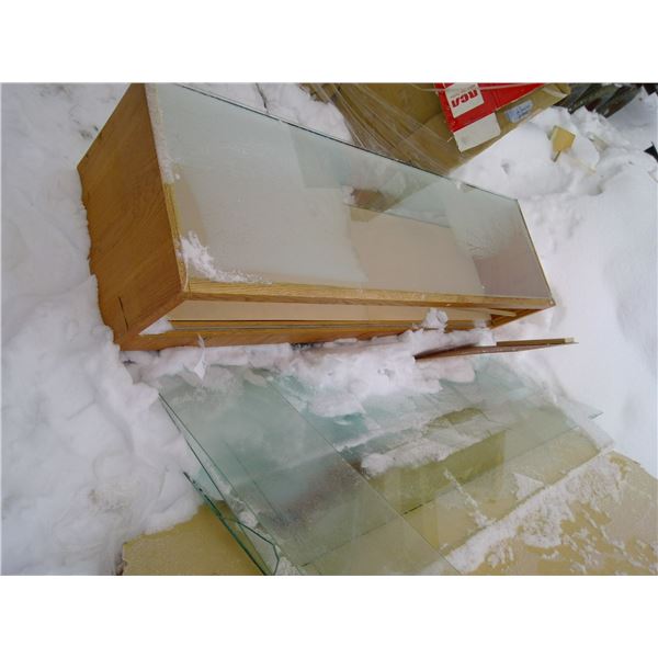 Glass display case (76X22X 17.5)with extra pieces of glass