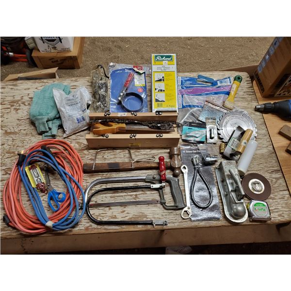 LARGE ASSORTMENT OF TOOLS - ELECTRICAL CORDS, SAWS, HITCH, DRAIN AUGER, TAPE MEASURE, ETC