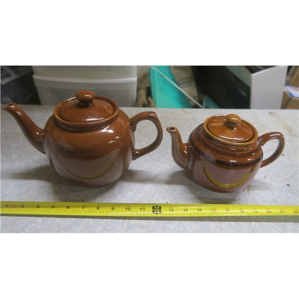 2 teapots - 1 chipped spout