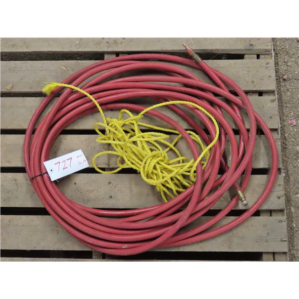 Air compressor hose (approximately 20ft long) + rope