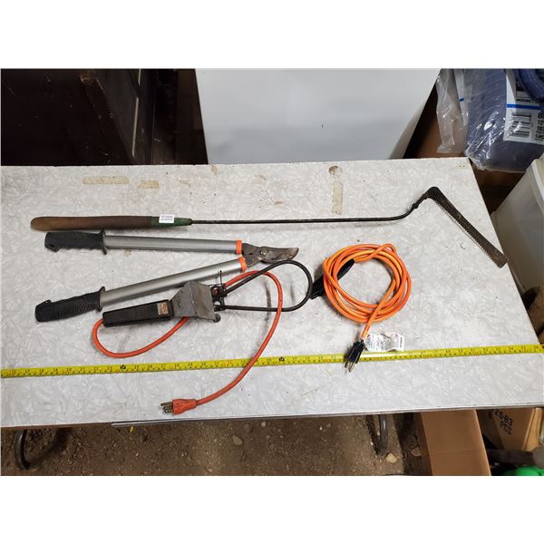 pruner, weed whip, charcoal lighter, extension cord