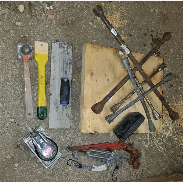 lot of tools - chain tightener, painting, speed wrenches, wheeled dolly
