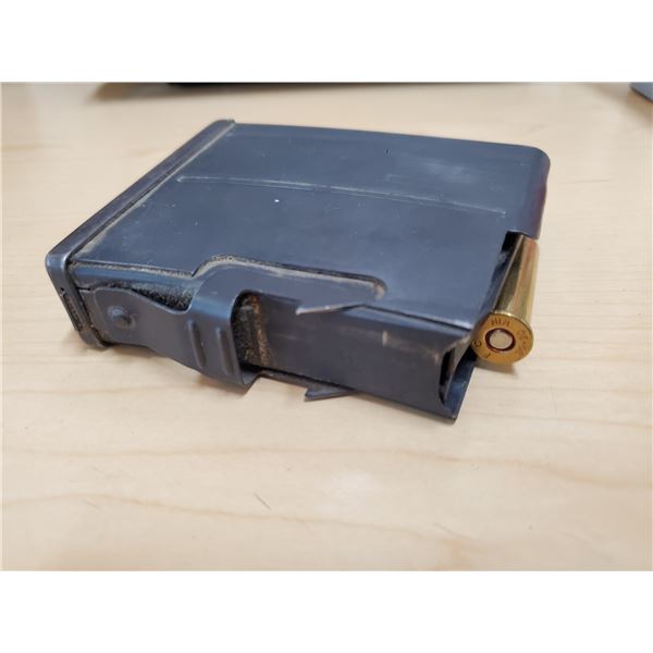 unknown rifle ammunition clip (30-30 win used as example only)