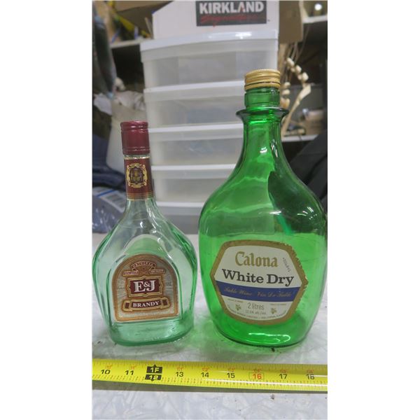 F&J brandy bottle and calona white dry table wine bottle