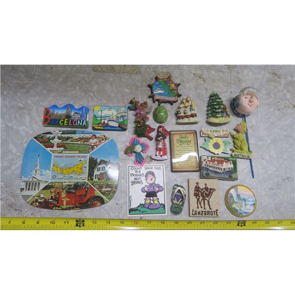 lot of assorted fridge magnets and PEI wall decoration