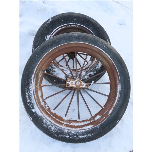 2 Antique steel rims with wheels implement tires 7.50-36, 11.25-28