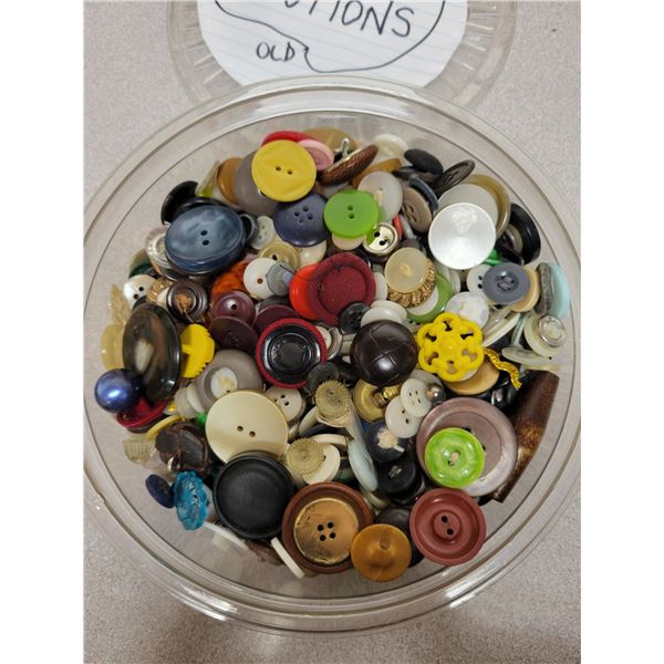 Bucket of of old old buttons