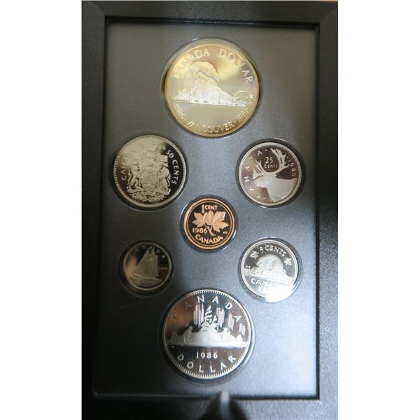 1986 Vancouver Centennial Proof Set. 7-coin Proof Set includes Vancouver Centennial Silver Dollar de