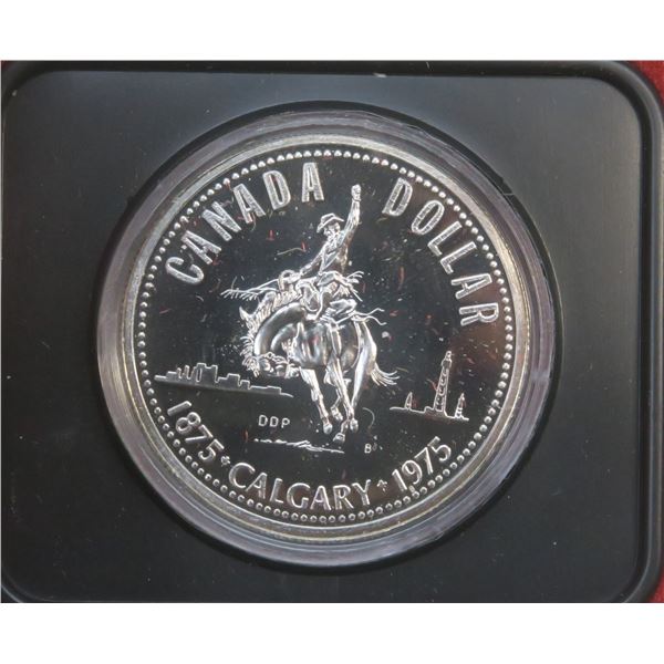 1975 Calgary Centennial Silver Dollar. Bright White. Housed in its original RCM black clamshell case