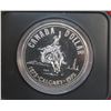Image 1 : 1975 Calgary Centennial Silver Dollar. Bright White. Housed in its original RCM black clamshell case