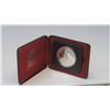 Image 2 : 1975 Calgary Centennial Silver Dollar. Bright White. Housed in its original RCM black clamshell case