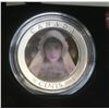 Image 2 : 2014 Haunted Canada: Ghost Bride 25 Cents. Lenticular Image has the ghost’s eyes open & shut. Specim