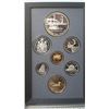 Image 1 : 1991 Proof Set. 7-coin set includes Frontenac Silver Dollar and Scarce 1991 Caribou 25 cents. Housed