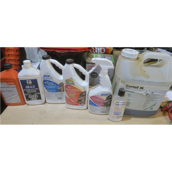 assorted fluids - herbicide, RV cleaner, chain oil, etc.