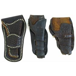Collection of 3 leather holsters which include