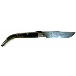 Large knife with etched blade marked Toledo