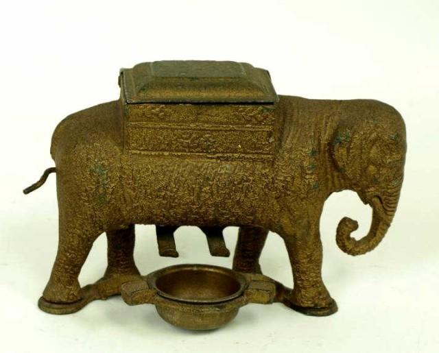 Cast iron elephant cigarette dispenser