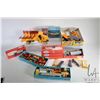 Image 1 : Tray lot of HO scale train accessories including f ive boxed Ulrich die-cast model kits, two Kibri m