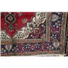 Image 2 : 100% Iranian wool area carpet "Tabriz" with center medallion, red background and overall floral desi