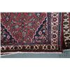 Image 2 : 100% Iranian wool carpet runner "Hamedan" with center medallion, red background and overall floral d