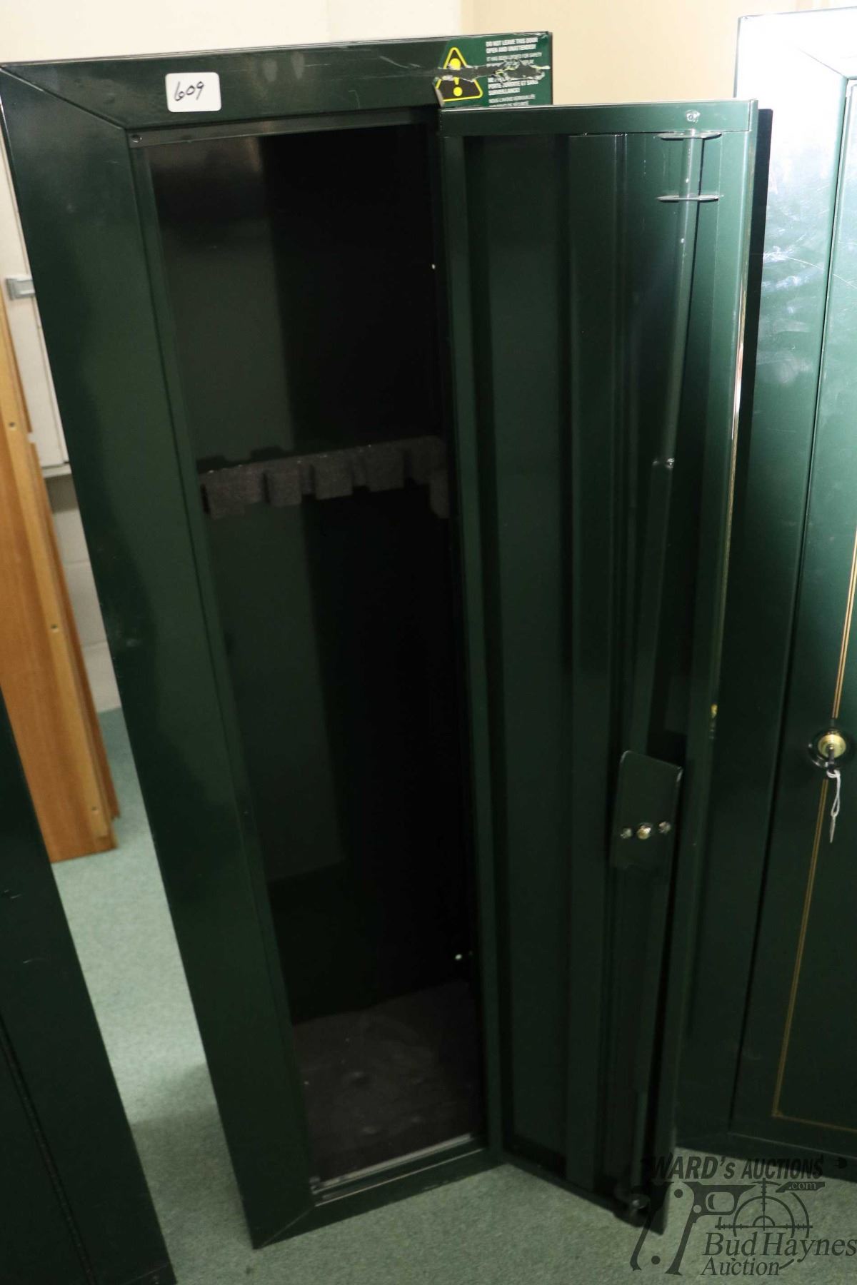 Stack-On metal gun locker with room for 10 rifles. Measuring 53 inches ...