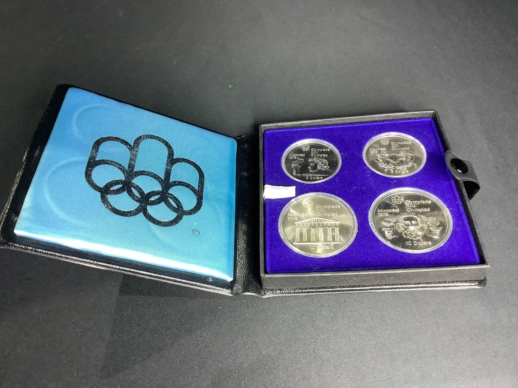 1976 MONTREAL OLYMPICS STERLING SILVER COIN SET - Able Auctions 1976 montreal olympics silver coin set