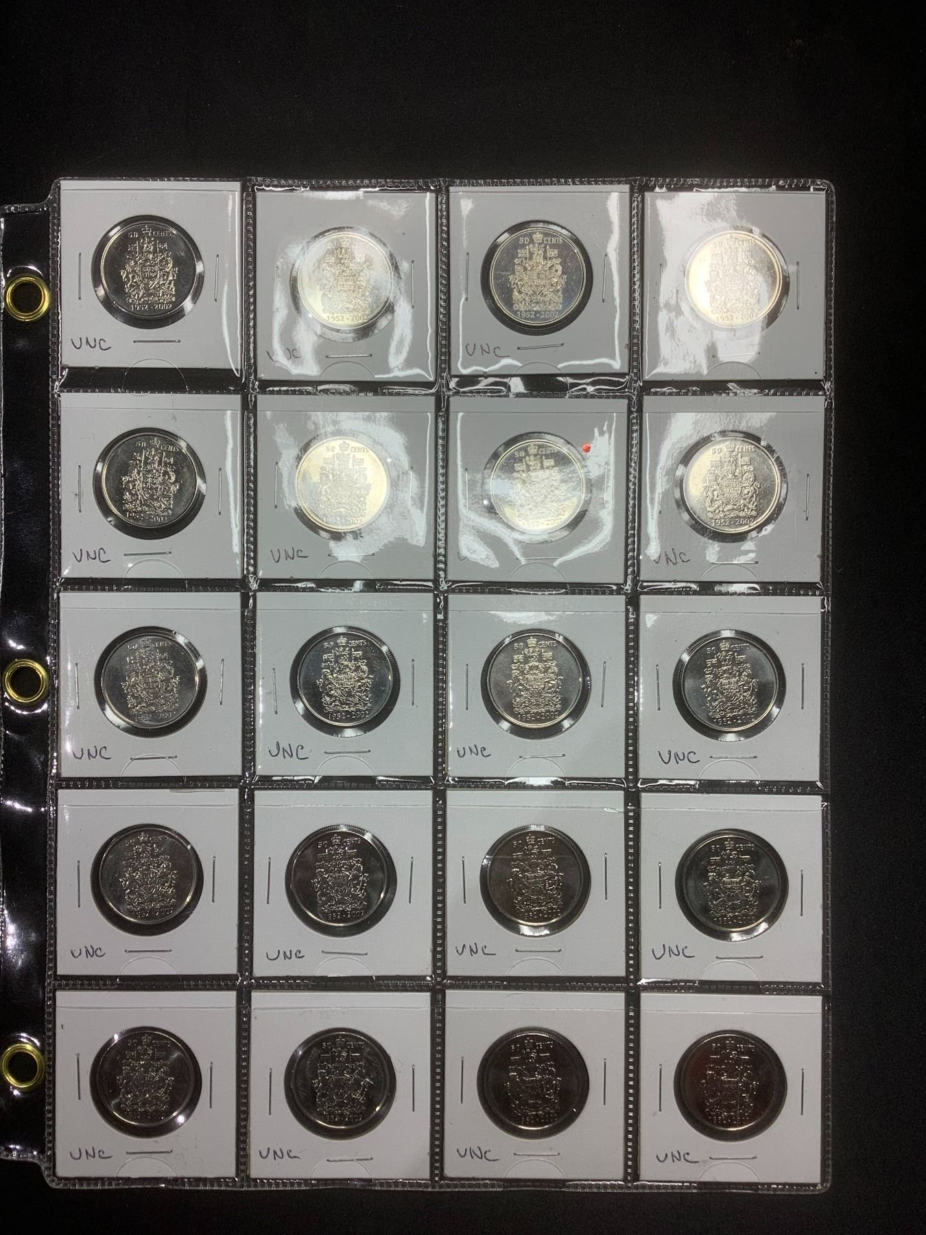 Canadian Coin Collection Sheets SHEET OF 20 CANADIAN 50 CENT COINS - Able Auctions