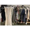 Image 2 : Rack full of assorted outfits - includes Shirt, Sweaters, pants etc.