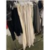 Image 3 : Rack full of assorted outfits - includes Shirt, Sweaters, pants etc.