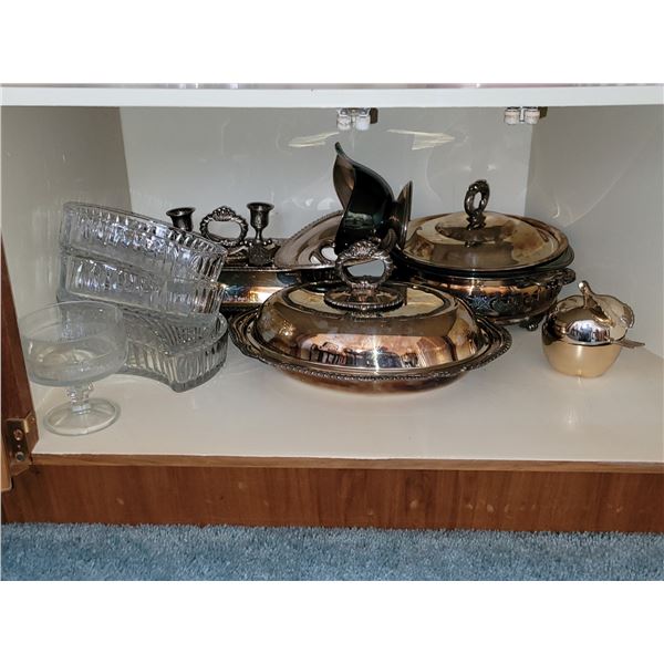 SHELF OF SILVER SERIVNG WARE AND CRYSTAL