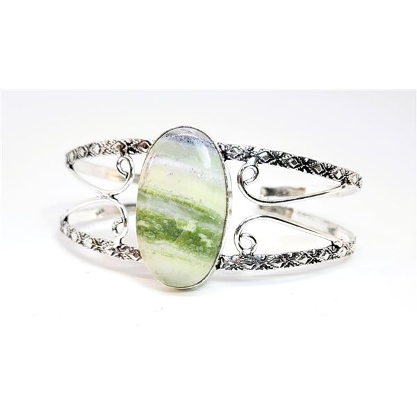 NATURAL OVAL SWISS GREEN OPAL CUFF STYLE