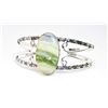 Image 1 : NATURAL OVAL SWISS GREEN OPAL CUFF STYLE