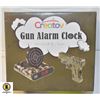 Image 1 : GUN ALARM CLOCK, REPACK.