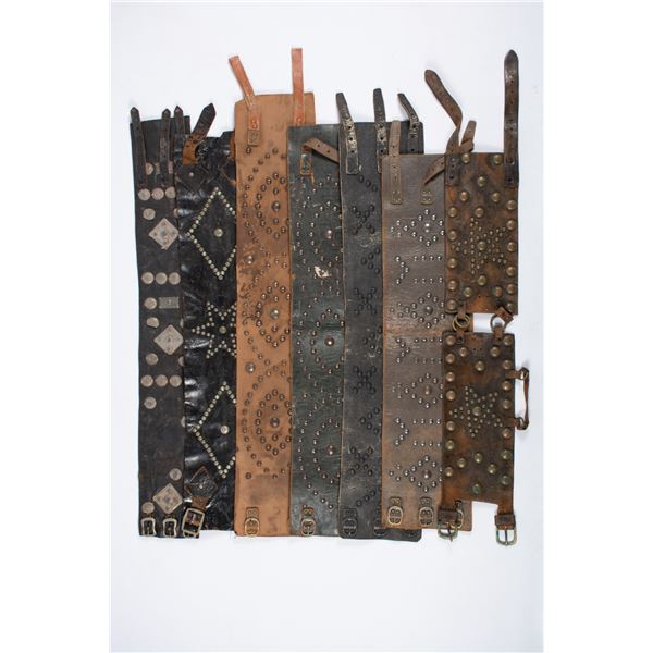 Lot of Seven (7) Studded Bronc Belts