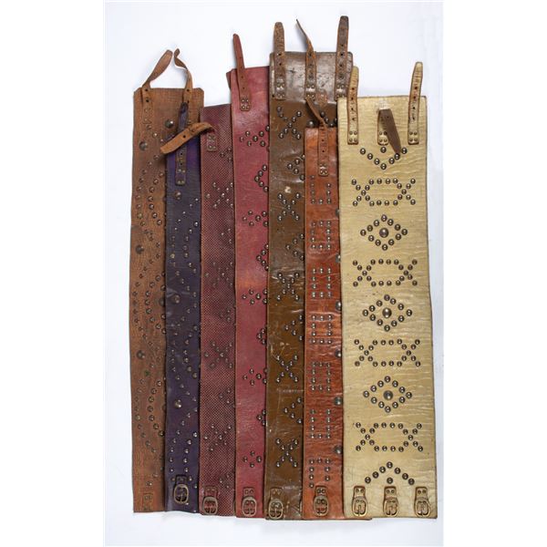 Lot of Seven (7) Studded Bronc Belts