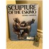 Image 1 : Sculpture of the Eskimo by George Swinton and miniature eskimo statue