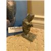 Image 3 : Sculpture of the Eskimo by George Swinton and miniature eskimo statue