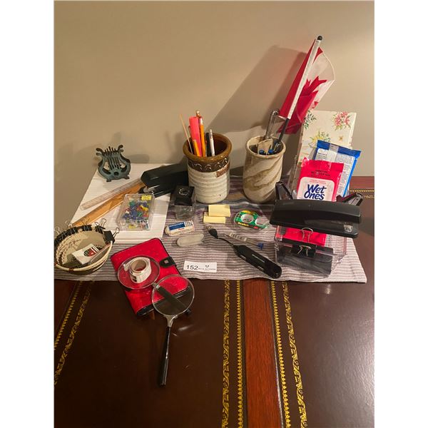 Stationary Items  Letter holder, magnifying glasses, staplers, tape, pens paper clips & much more!